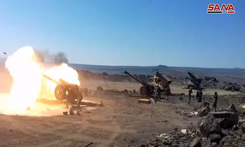 Trong diễn biến liên quan hồi tuần trước, giao tranh ác liệt giữa lực lượng chính phủ Syria và nhóm khủng bố IS đã diễn ra tại khu vực phía đông nam sa mạc Palmyra. Ảnh: SANA.