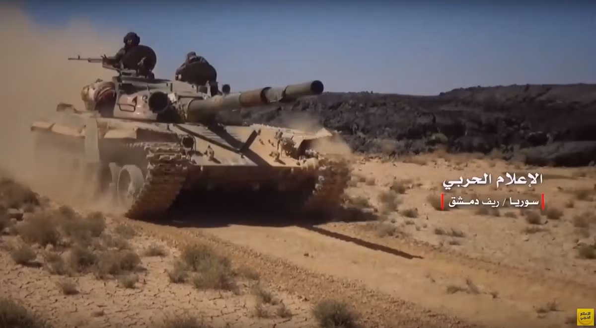 Trong diễn biến khác trên chiến trường Syria, Quân đội Syria đã giải phóng thêm nhiều khu vực ở vùng al-Safa chiến lược, tỉnh Sweida, khỏi các tay súng khủng bố IS. Ảnh: AMN.