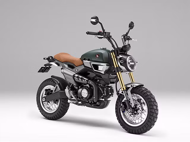 Dù vẫn có dáng scrambler, nhưng GROM50 Scrambler Concept-Two có thiết kế "hoài cổ" hơn. Cả 2 chiếc xe đều sử dụng phiên bản côn tay của động cơ 50 cc được trang bị cho chiếc Super Cub 50 concept nêu trên.