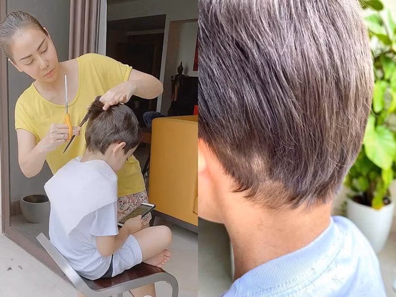 Thu Minh cắt tóc cho con trai tại nhà. Cô cũng thừa nhận thành quả không hoàn hảo, một mảng tóc ở phía dưới gáy của cậu bé bị cắt mất vì 'người thợ không chuyên'.