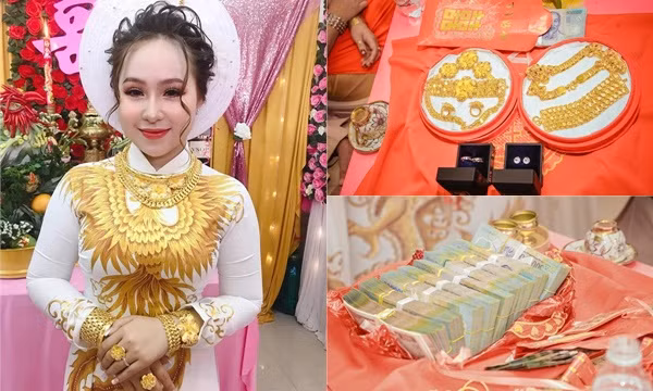 Những đám cưới "khủng" được đầu tư tiền tỷ, hay những cô dâu vàng đeo trĩu cổ trong ngày cưới không còn là chuyện hiếm. Tuy nhiên, cô dâu tên Minh Thư (Kiên Giang) dù chỉ mới dạm ngõ nhưng đã nhận được của hồi môn khủng.