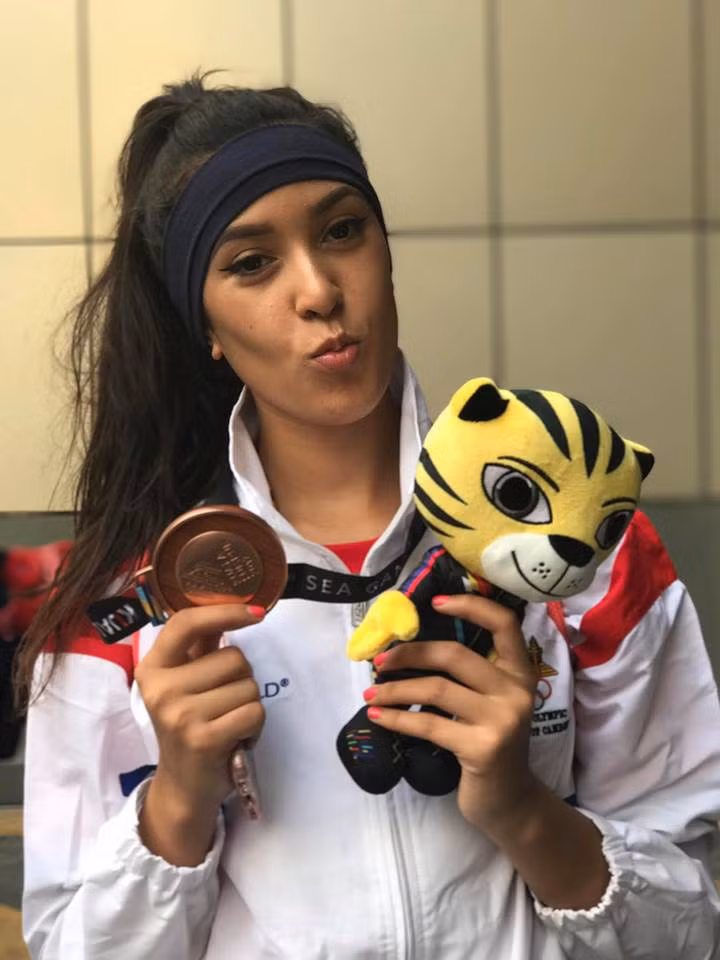 Nicole như một luồng gió mới cho không chỉ SEA Games 29 mà còn cho cả dân mạng về việc con gái học võ có nhan sắc xinh như hoa. Ảnh trong bài: Facebook nhân vật.