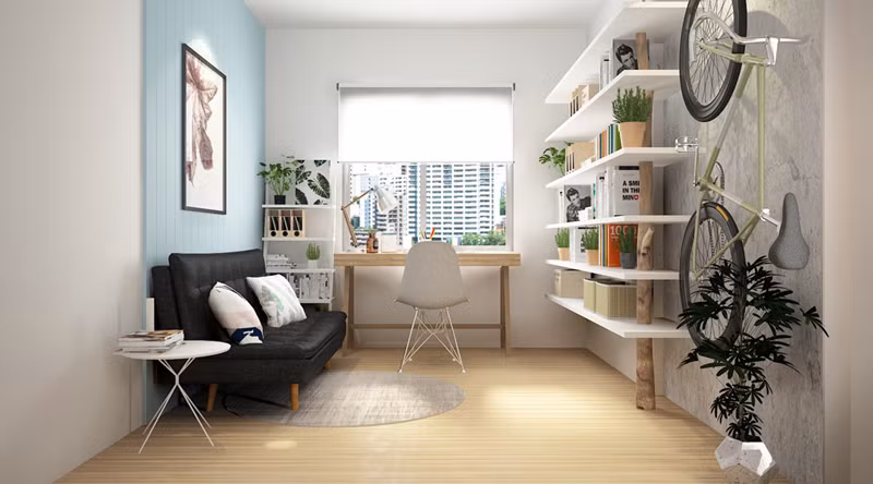 Bàn đặt gần cửa sổ nên căn phòng rất ít khi phải dùng đèn, xe đạp treo tường trở thành tác phẩm trang trí.