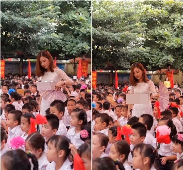 Thúy Ngân đã từng gây sốt mạng xã hội khi hình ảnh xinh đẹp của cô được phụ huynh chụp lại rồi chia sẻ trên mạng xã hội nhưng mới đây, cô nàng này lại khiến dân mạng dậy sóng với hình ảnh quạt mát cho các em học sinh trong lễ khai giảng.