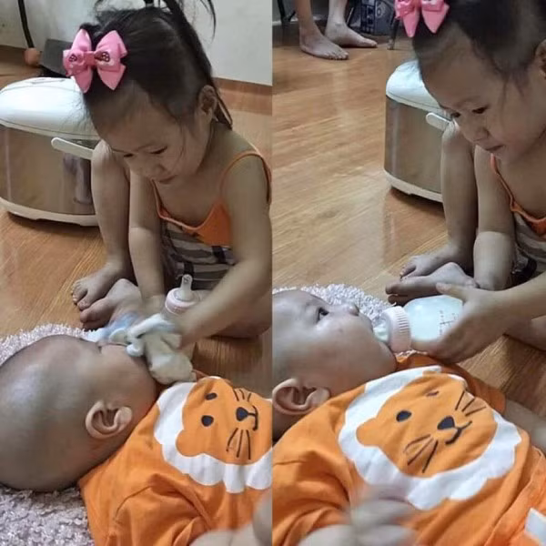 Cuoi ra nuoc mat canh me bim sua de hai con qua sat nhau-Hinh-6