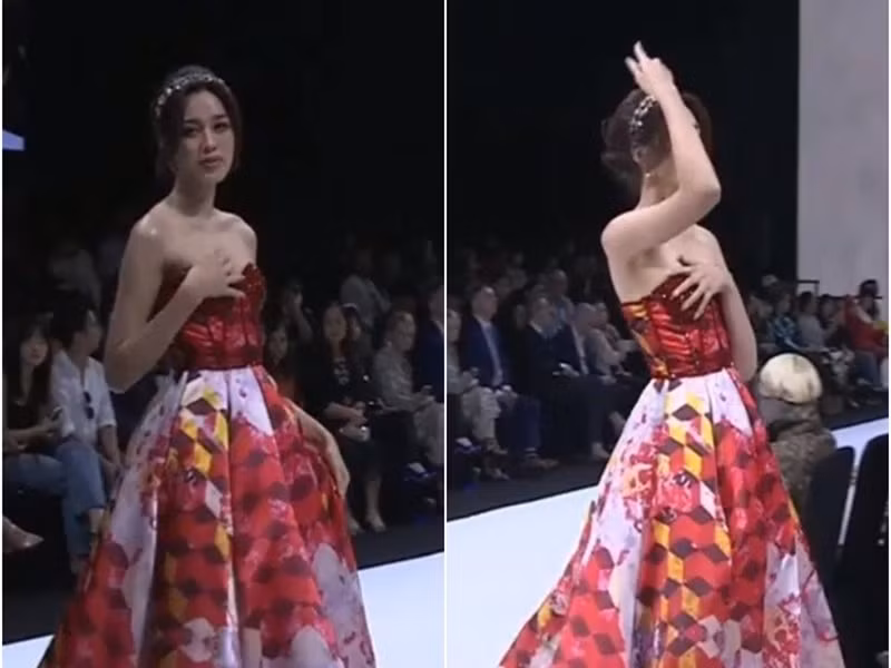 Đỗ Thị Hà dùng một tay giữ váy để tránh tiếp tục lộ hình ảnh kém duyên. Ảnh: Gia đình xã hội