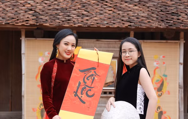 BTV Hoai Anh dua con gai xuat hien tren song truyen hinh