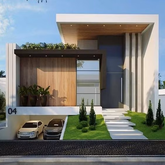 Nhà 1 tầng tận dụng tầng trệt làm hầm để xe, phần lửng lát thêm cỏ và đá làm bậc thang. Ảnh: Xaydungso.