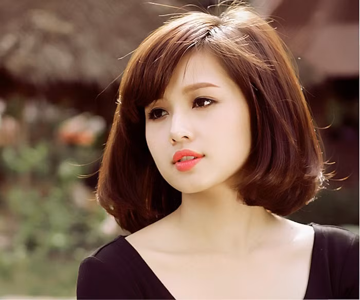 Những người có dáng gầy nhưng phần đầu tròn và đầy đặn được cho là có số phú quý. 'Bà mẹ một con' Tâm Tít là một trong số đó.