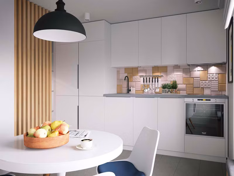 Khu vực nấu nướng với các loại tủ bát, tủ lạnh… âm tường để tiết kiệm diện tích.