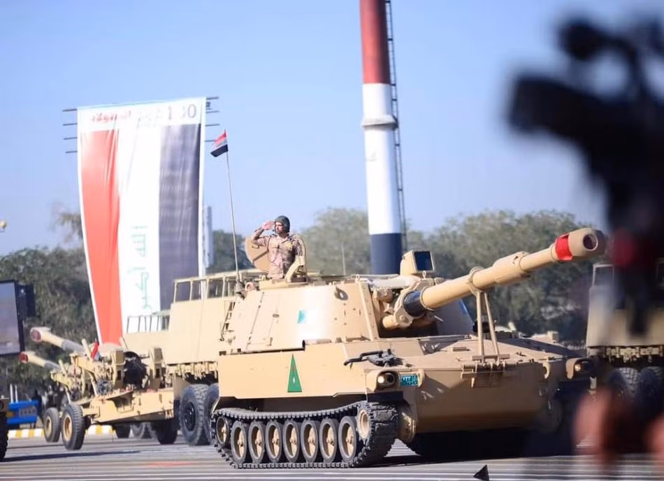 Pháo tự hành M109 của Quân đội Iraq tham gia cuộc duyệt binh kỷ niệm 100 năm ngày thành lập quân đội. Nguồn ảnh: Sina.