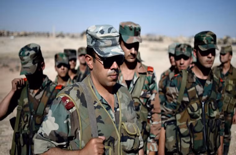 Quân đội Syria cũng đã được đặt trong tình trạng báo động cao và thề sẽ đáp trả bất cứ cuộc tấn công nào từ Washington và đồng minh. Ảnh: FNA.