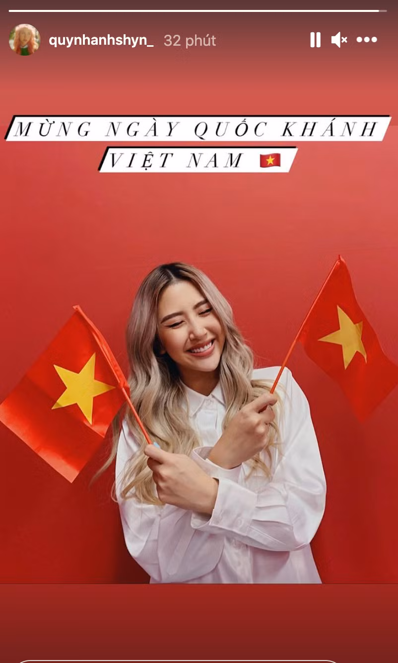 Hot girl Quỳnh Anh Shyn đăng tải hình ảnh tươi tắn, trên tay cầm cờ đỏ sao vàng mừng Quốc khánh 2/9.