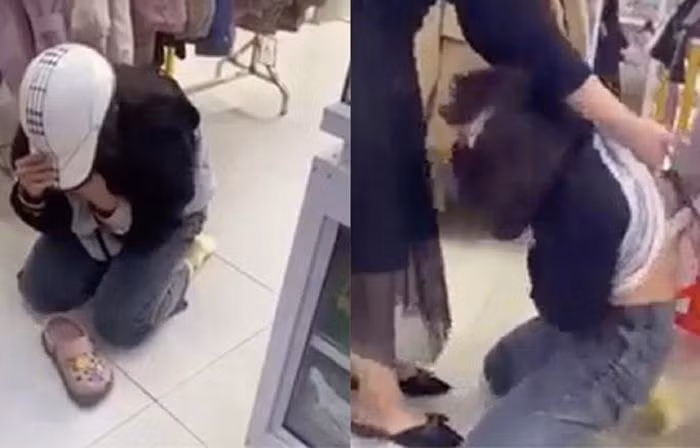 Trước đó, ngày 3/12, trên mạng xã hội facebook xuất hiện một đoạn clip ghi lại cảnh cô gái đầu đội mũ bảo hiểm đang quỳ gối dưới đất khóc lóc van xin khi bị một người phụ nữ liên tục dùng kéo cắt tóc và hành hạ tại một cửa hàng quần áo.