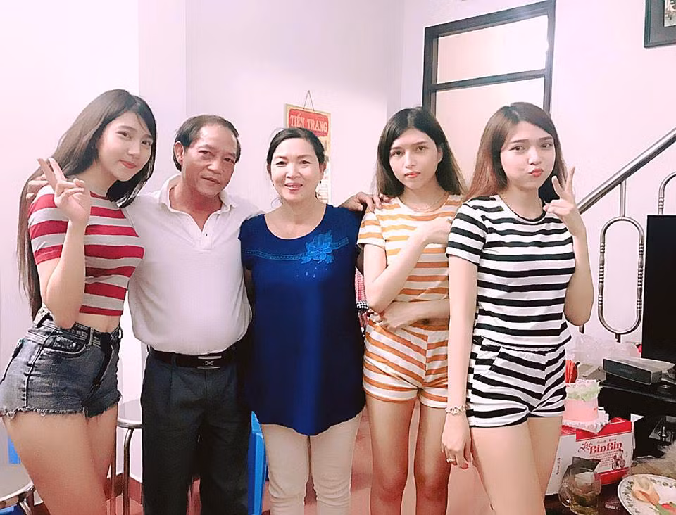 Co gai trong anh gia dinh co “3 nang tien” len tieng