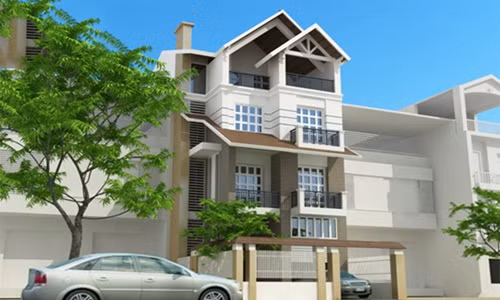 Mẫu nhà này lược bỏ các chi tiết phào chỉ hoa văn rườm rà, chủ yếu sử dụng những khối hình ngang, dọc đơn giản. Ảnh: Arcviet.