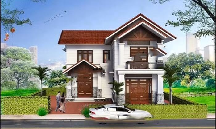 Mẫu nhà 2 tầng hình chữ L tinh tế nhờ lớp sơn màu trắng chủ đạo kết hợp hài hòa với hệ thống cửa gỗ. Ảnh: Nhadepktv.