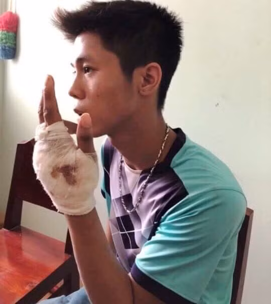 Nguyễn Hữu Tình tại cơ quan công an - Ảnh: Công an cung cấp