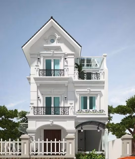 Nhà 3 tầng mái thái màu trắng đẹp nổi bật, gồm 3 phòng ngủ rộng rãi, mỗi phòng ngủ đều thiết kế cửa sổ riêng biệt. Ảnh: Bannhabinhduong.