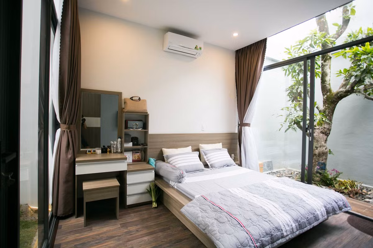 Phòng ngủ với nội thất gam màu trung tính chủ đạo.