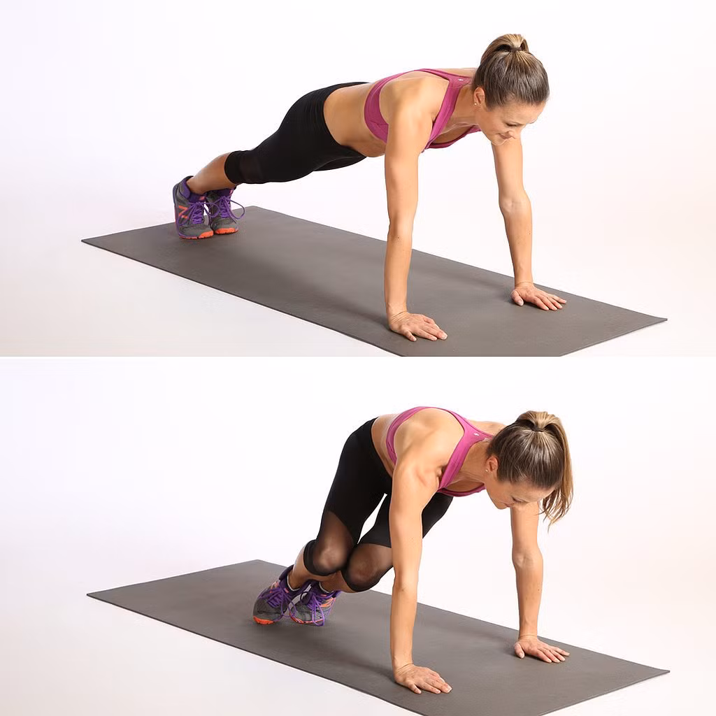 Bắt đầu bằng tư thế plank nhưng hai chân chạm nhau, hóp bụng rồi dùng lực nhảy sang phải hoặc sang trái sao cho đầu gối gần chạm khuỷu tay. Lặp lại khoảng 20 lần.