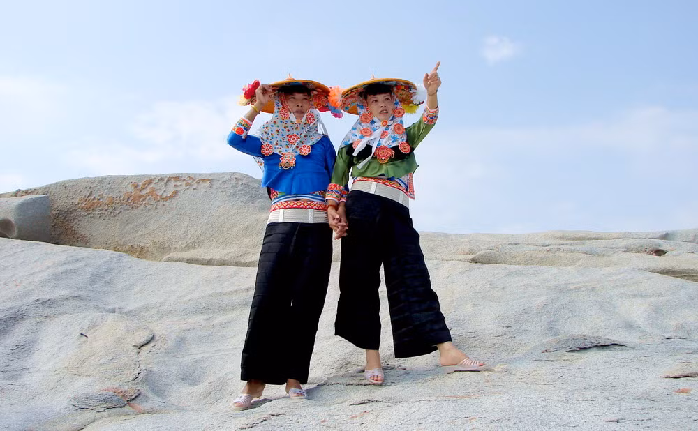 Toc nguoi goc Viet mac trang phuc la o Trung Quoc