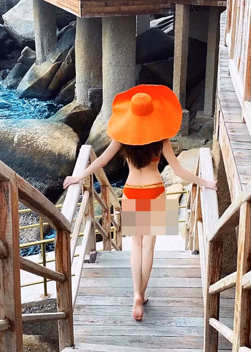 Ho Ngoc Ha khoe dang nuot du mang bau thang thu 5