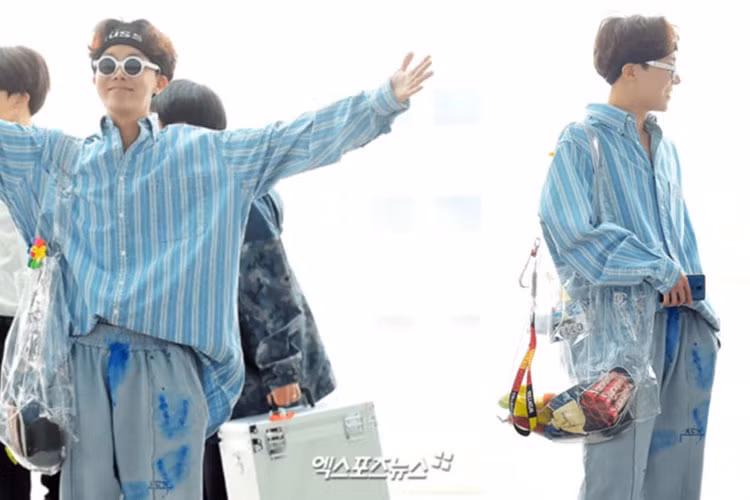 J-hope (BTS): j-hope theo đuổi phong cách thời trang phá cách và mang tính ngẫu hứng khá "nghệ sĩ". Chiếc quần với những mảng màu được vẩy ngẫu hứng kết hợp cùng sơ mi vintage và túi xách trong suốt là sự lựa chọn khá ấn tượng mà ít người dám thử.