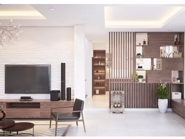 2. Thiết kế vách ngăn phòng khách bằng gỗ tự nhiên Nếu định hướng theo đuổi phong cách cổ điển, sang trọng cho ngôi nhà của mình, bạn chắc chắn không nên bỏ lỡ mẫu tủ vách ngăn phòng khách và bếp được thiết kế từ chất liệu gỗ tự nhiên như xoan đào, gỗ sồi,… Loại vách ngăn này sẽ đảm bảo tính chắc chắn, bền vững theo thời gian, mang lại cho người dùng cảm giác an tâm hơn về chất lượng.