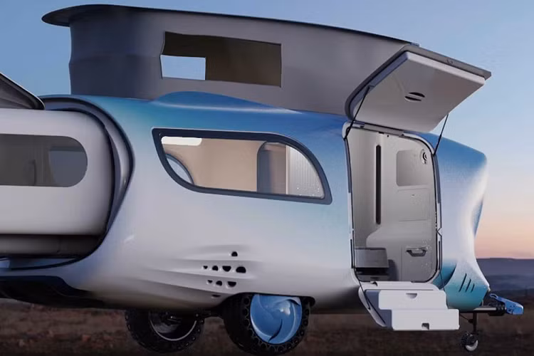Mẫu concept xe moóc này về cơ bản có thể mở ra thành một ngôi nhà cắm trại đầy đủ tiện nghi, nhờ một những bộ phận có thể trượt ra hoặc bật lên, cung cấp chỗ ở cho một gia đình 4 người. Nó là một mẫu xe nhỏ gọn, lấy cảm hứng từ loài cá voi ở cả hình dáng thiết kế và nước sơn, có phần trượt ra ở phía sau và một vài chiếc lều.