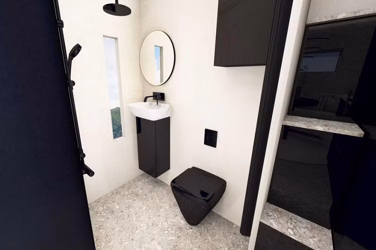 Bước ra khỏi phòng tắm, bạn sẽ thấy phòng ngủ chính với giường cố định ở hốc tường phía trên cabin. Một phần nóc có thể bật lên trên hốc tường sẽ giúp người nằm ngủ có thêm chút không gian. 