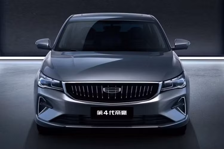 Có thể thấy Geely Emgrand 2021 mới sở hữu một khoang cabin có thiết kế tối giản - gần giống như Audi, với bảng điều khiển trung tâm trông khá mỏng, cửa gió điều hòa trải dài hết chiều rộng của táp-lô, màn hình cảm ứng trung tâm đặt nổi và cần số chữ T lạ mắt. 