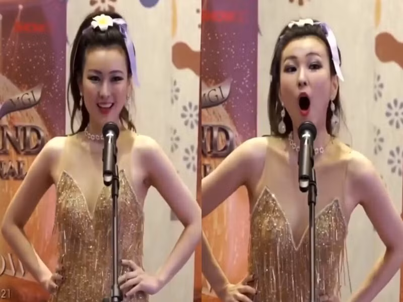 Khi giới thiệu đến từ Hong Kong, người đẹp cố tình lên tông đến mức đương kim Hoa hậu Hòa bình Quốc tế cũng phải bật cười. Ảnh: Yan
