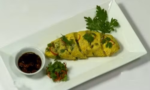 Trứng chiên ngải cứu óc lợn.