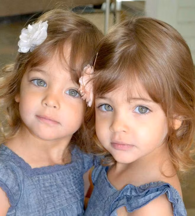  Hai bé gái này là con của cặp vợ chồng sở hữu dung nhan cũng "không phải dạng vừa" - Jaqi và Kevin.