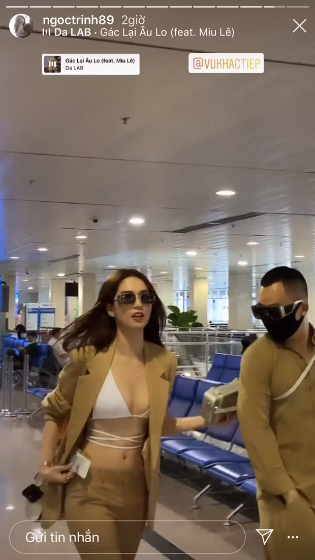 Sải bước ở sân bay, Ngọc Trinh diện mốt nội y kết hợp vest thanh lịch.