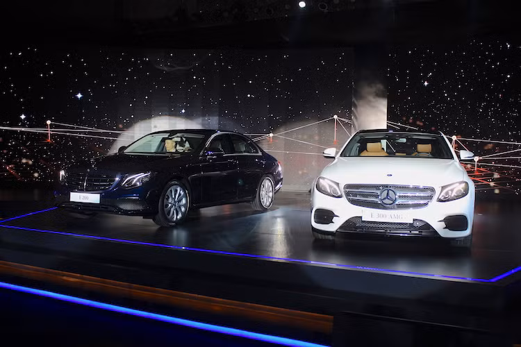 Hiện tại, phiên bản E200 đang được Mercedes lắp ráp tại Việt Nam với tỉ lệ nội địa hóa thấp do không tìm được những nhà cung ứng linh kiện đủ tiêu chuẩn ở nước ta. Trong khi đó, phiên bản E300 AMG tạm thời đang được nhập từ Đức, và cũng sẽ được lắp ráp tại Việt Nam vào năm sau.