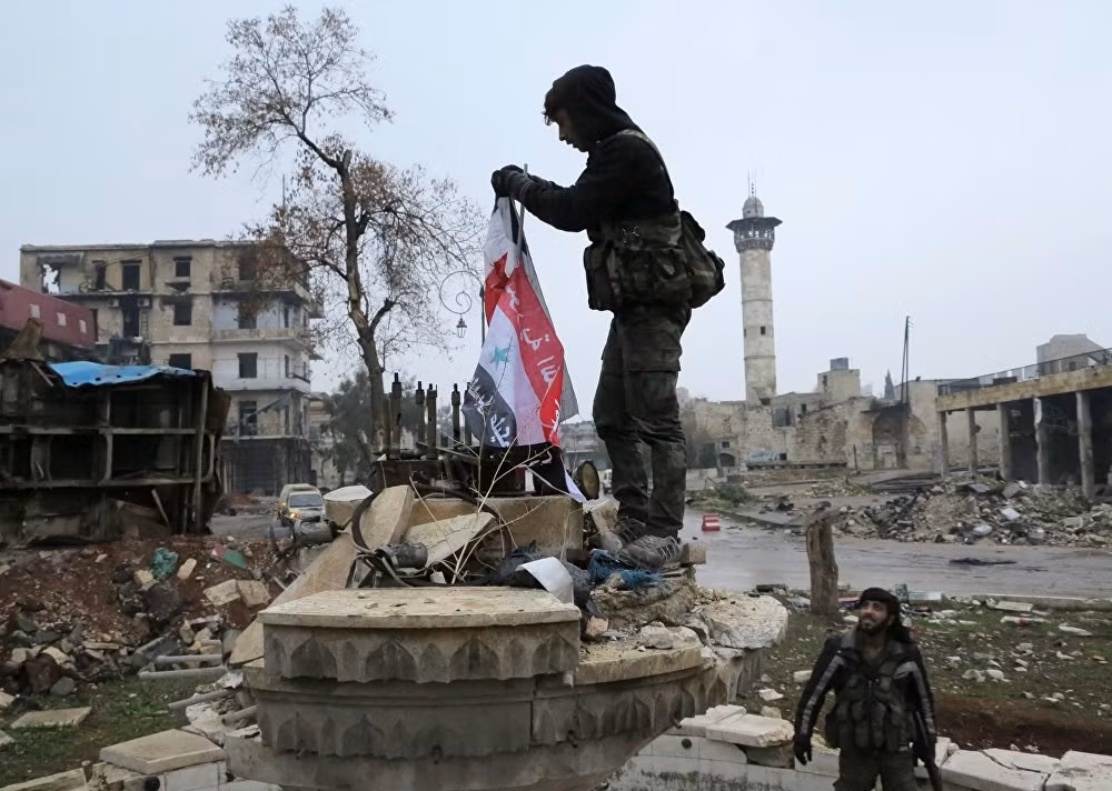 Lính Syria ở một quận phía đông mới được giải phóng. Ảnh Sputnik.