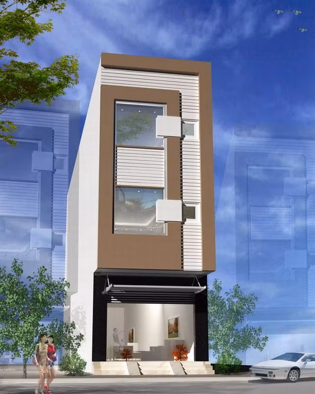 Ngôi nhà bắt mắt khi tầng 1 được tạo dấu ấn đậm nét với tông màu đen, các tầng trên được ốp tường trang trí. Ảnh: Kientaoviet.