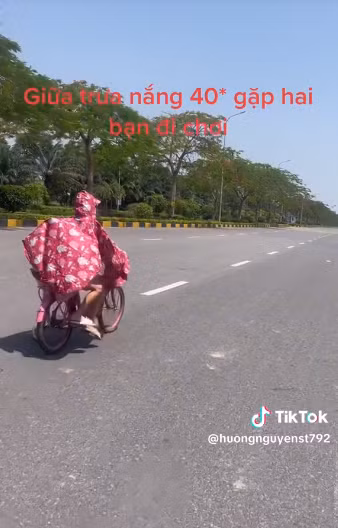 "Giống mình hồi đi học trưa về quên ko mang áo chống nắng phải mặc áo mưa", "Thà chết nóng còn hơn chết nắng", "Ngày xưa đen nhẻm vì trưa nắng trốn mẹ đi chơi",...là những bình luận của cư dân mạng sau khi xem đoạn clip này.