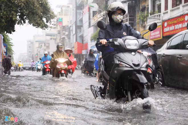 Du bao thoi tiet hom nay 26/8: Bac bo, Trung co mua rao va dong