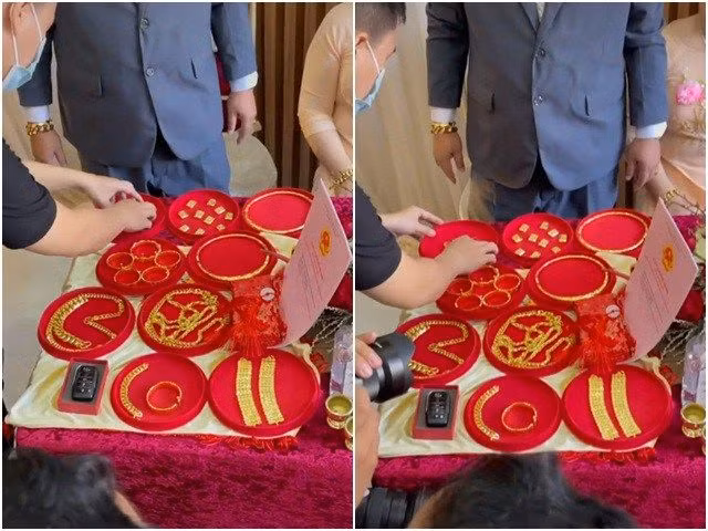 Tất cả các món quà đều được sắp xếp ngay ngắn trên bàn nhưng chưa hết vì trên người cô dâu còn đeo ngập vàng đến mức không đếm xuể. Ảnh: Bestie.