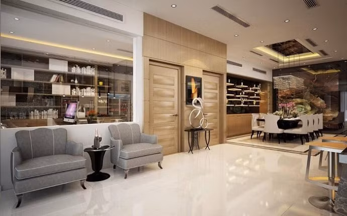 Phòng khách ấm cúng nhưng không kém phần sang trọng khi được trang bị ghế sofa đôi và 2 sofa nhỏ. Ảnh: Lao động