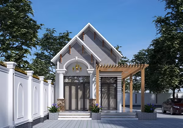 Mẫu nhà mái thái cấp 4 kích thước 5x20m mang phong cách hiện đại, sử dụng tone màu tươi sáng tạo nên kiến trúc ngoại thất ưa nhìn. Ảnh: SHB House