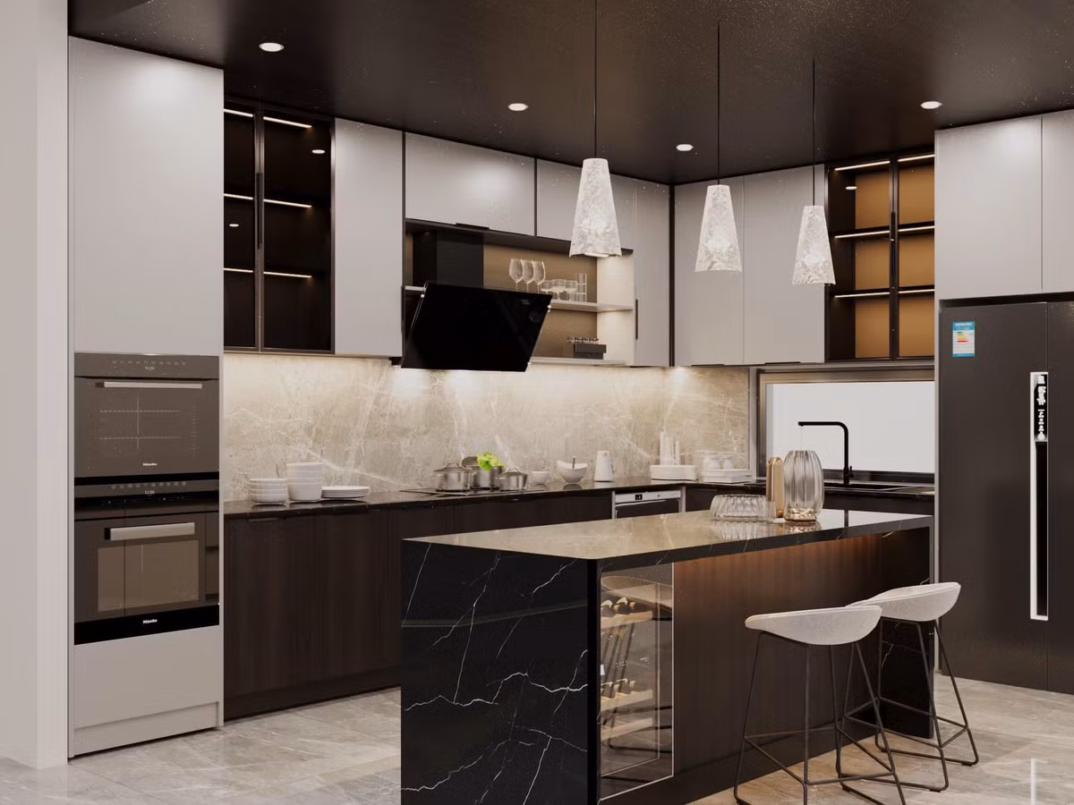 Khu vực bếp không quá lớn nhưng đầy đủ các trang thiết bị, chính giữa bếp là đảo bếp màu đen kết hợp tủ đựng đồ uống.Ảnh: FB Phạm Tuấn Hải