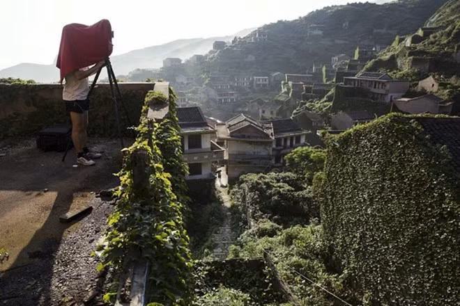 Nhiều nhiếp ảnh gia chuyên nghiệp tới ngôi làng để chụp những tấm hình tuyệt vời.