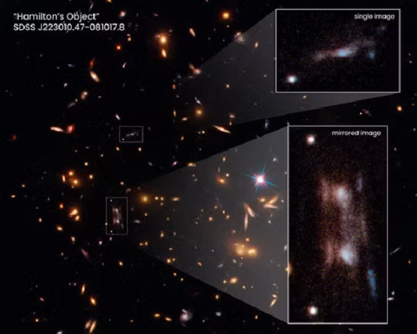 Kính viễn vọng không gian Hubble (NASA/ESA) đã ghi lại quang cảnh một thiên hà xoắn ốc tưởng chừng bị xé làm 3 bởi "quái vật". Các nhà thiên văn gọi sự kiện này là "Vật thể của Hamilton".