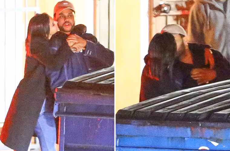 Sau bữa tối, khi đứng đợi xe, Selena Gomez và The Weeknd đã có vô số những hành động tình cảm như ôm, hôn. (Ảnh: TMZ)