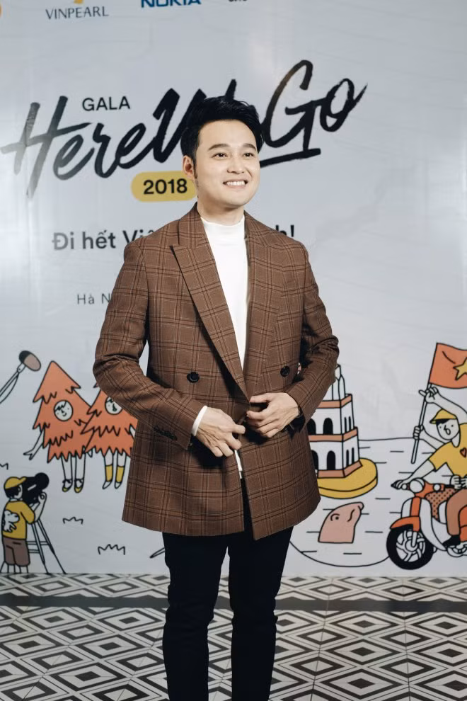 Quang Vinh lan dau xuat hien sau on ao voi dai gia Nguyen Kim